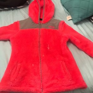 A hot pink sport fila jacket